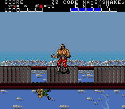 Now, if this was a REAL action movie, SNAKE would grab on to the bottom of the bridge and sock Big Sniper in the face when he looked for him.