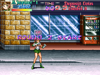 See that arcade in the background? Yeah, it's got Donkey Kong, Space Invaders, Metal Slug, Street Fighter II, The Outfoxies, Undercover Cops, XEXEX and all sorts of cool stuff THAT YOU'RE NOT PLAYING.